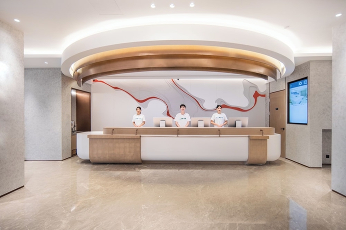 Imagen de los interiores del Hotel QingdaoWusiguangchangYaduoJiudian. Foto 6