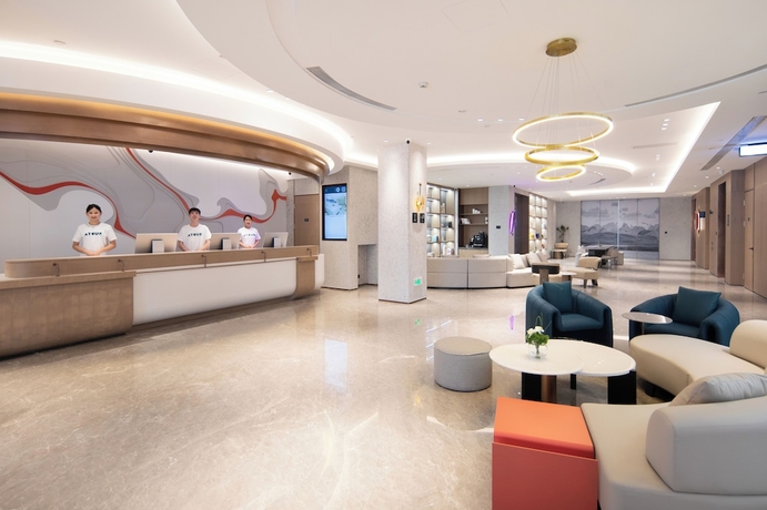 Imagen de los interiores del Hotel QingdaoWusiguangchangYaduoJiudian. Foto 10