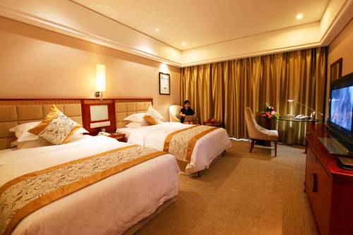 Imagen de la habitación del Hotel Qinghe Jin Jiang International. Foto 2