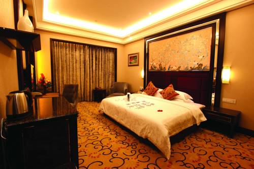 Imagen de la habitación del Hotel Qinghe Jin Jiang International. Foto 3