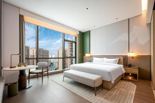 Imagen de la habitación del Hotel Qinglian Jinghe Wuhan Zoo International Expo Center Branch. Foto 15