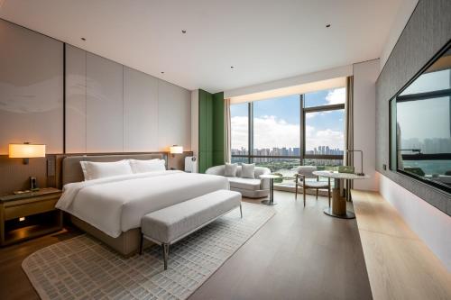 Imagen de la habitación del Hotel Qinglian Jinghe Wuhan Zoo International Expo Center Branch. Foto 16