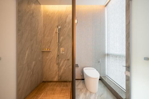 Imagen de la habitación del Hotel Qinglian Jinghe Wuhan Zoo International Expo Center Branch. Foto 17