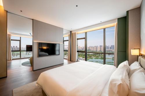 Imagen general del Hotel Qinglian Jinghe Wuhan Zoo International Expo Center Branch. Foto 8