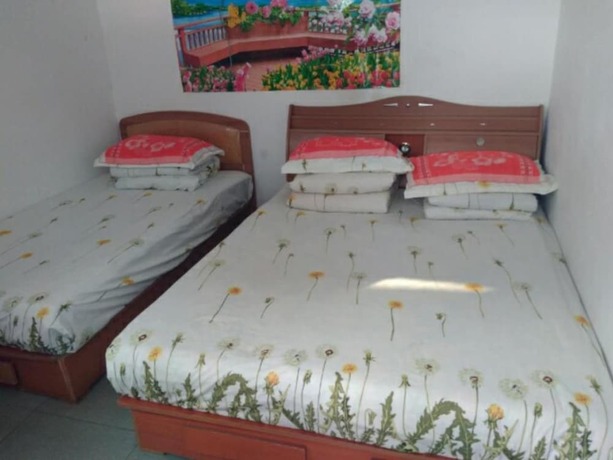Imagen de la habitación del Hotel Qinglongxia Pinfu Scenic Farm Stay. Foto 7