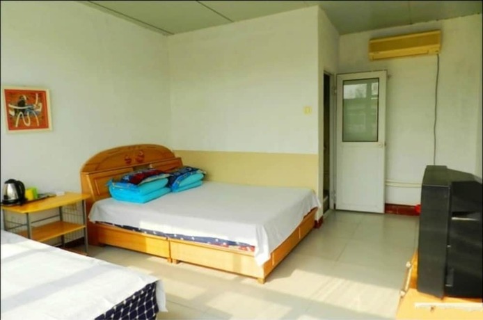 Imagen de la habitación del Hotel Qinglongxia Pinfu Scenic Farm Stay. Foto 9
