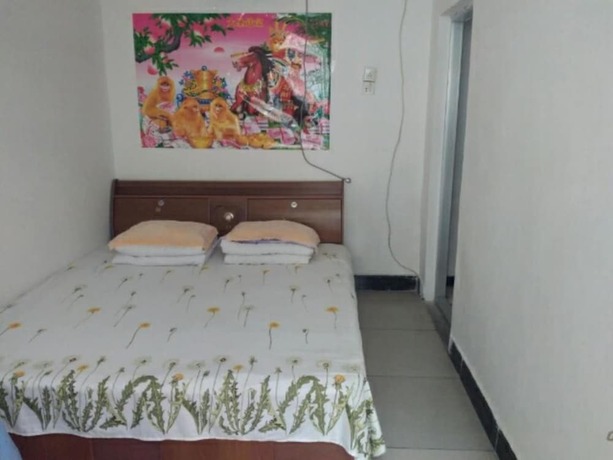 Imagen de la habitación del Hotel Qinglongxia Pinfu Scenic Farm Stay. Foto 10