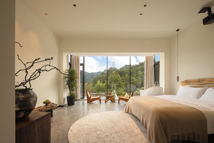 Imagen de la habitación del Hotel Qingmo Hidden Mid-Mountain. Foto 4