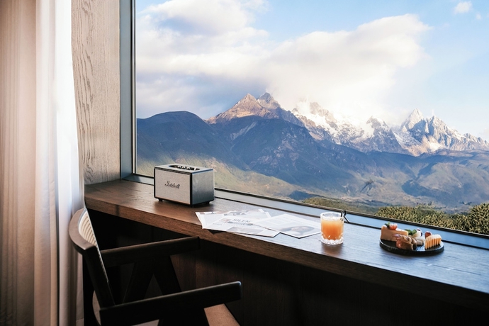 Imagen de la habitación del Hotel Qingshanyue Panorama Design Resort. Foto 9