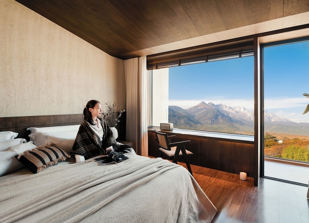 Imagen de la habitación del Hotel Qingshanyue Panorama Design Resort. Foto 10