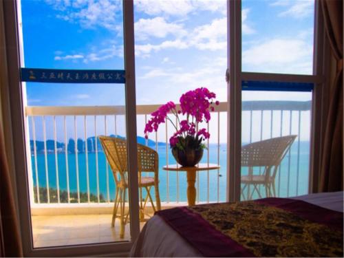 Imagen de la habitación del Hotel Qingtian Yutan Holiday. Foto 6