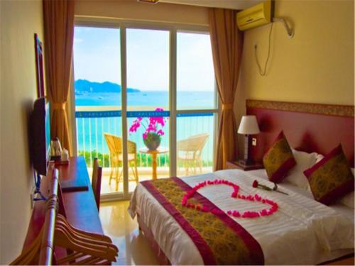 Imagen de la habitación del Hotel Qingtian Yutan Holiday. Foto 8