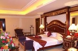 Imagen de la habitación del Hotel Qingyuan Gehao Holiday Hotel. Foto 3