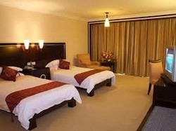 Imagen de la habitación del Hotel Qingyuan Gehao Holiday Hotel. Foto 4