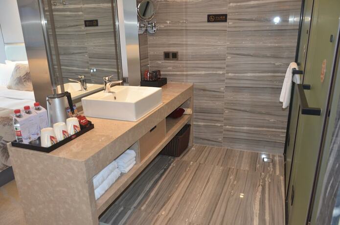 Imagen de la habitación del Hotel Qingyuan Yuanguang Argyle. Foto 11