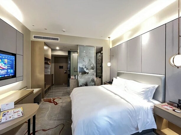 Imagen de la habitación del Hotel Qingyuan Yuanguang Argyle. Foto 15