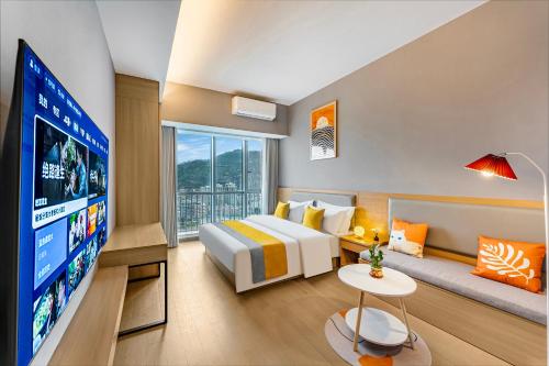 Imagen de la habitación del Hotel Qinman - Gongbei Port Fuhuari Branch. Foto 14