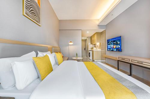 Imagen general del Hotel Qinman - Gongbei Port Fuhuari Branch. Foto 11