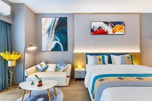 Imagen de la habitación del Hotel Qinman - Gongbei Port Fuhuari Branch. Foto 15