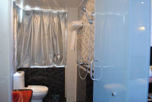 Imagen de la habitación del Hotel Qintian Business. Foto 2