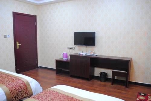 Imagen de la habitación del Hotel Qintian Business. Foto 3