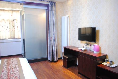 Imagen de la habitación del Hotel Qintian Business. Foto 4