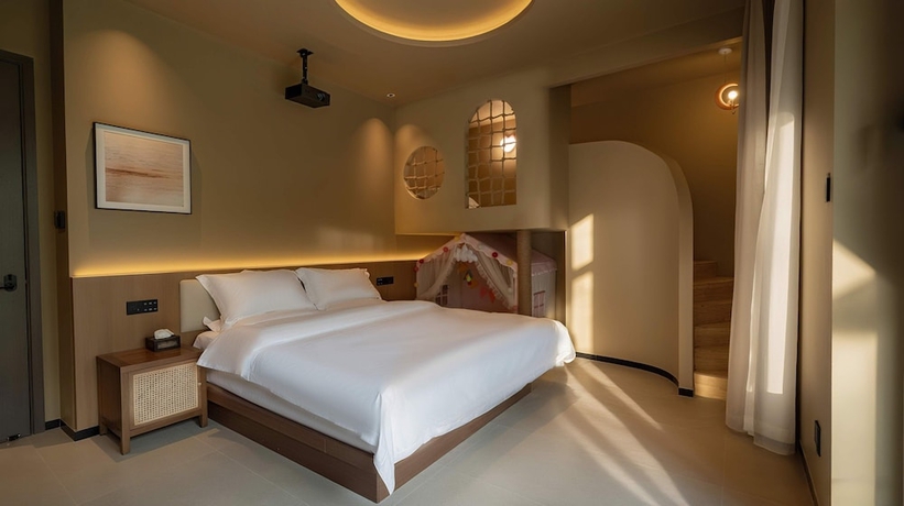 Imagen de la habitación del Hotel Qinxiang Pavilion. Foto 3