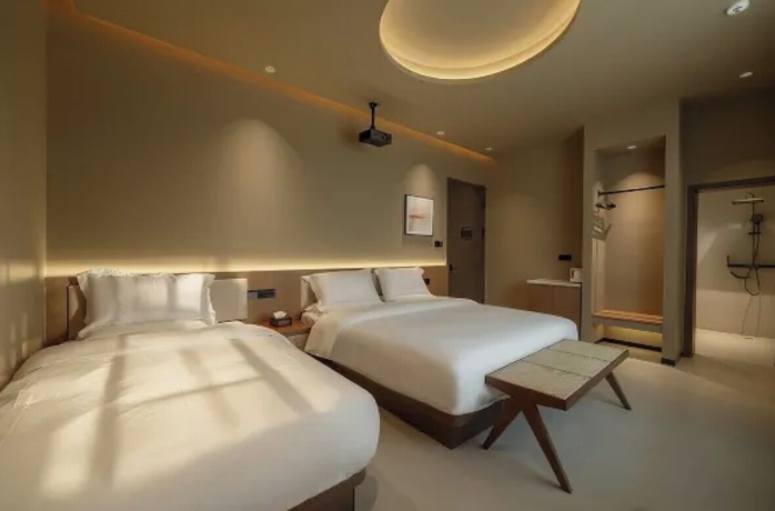 Imagen de la habitación del Hotel Qinxiang Pavilion. Foto 4