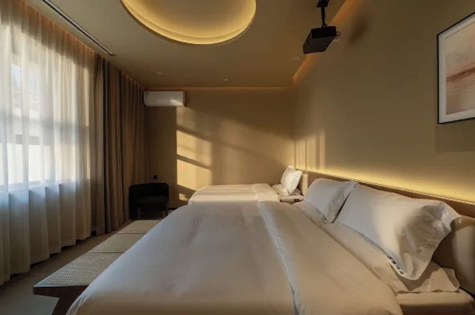 Imagen de la habitación del Hotel Qinxiang Pavilion. Foto 5