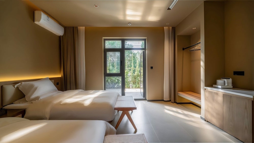 Imagen de la habitación del Hotel Qinxiang Pavilion. Foto 8