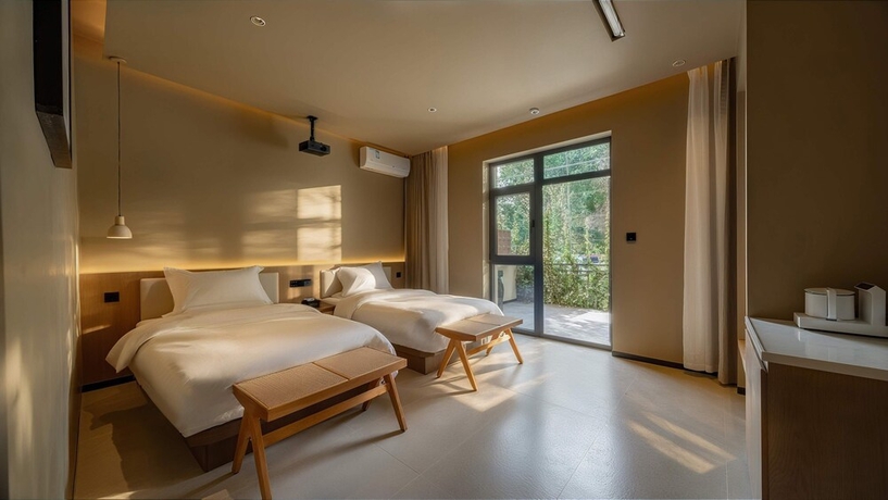 Imagen de la habitación del Hotel Qinxiang Pavilion. Foto 9