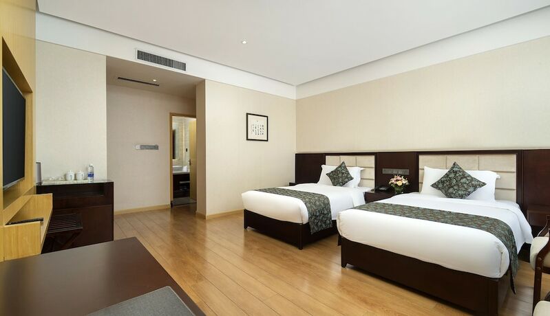 Imagen de la habitación del Hotel Qinxin Yayue. Foto 6