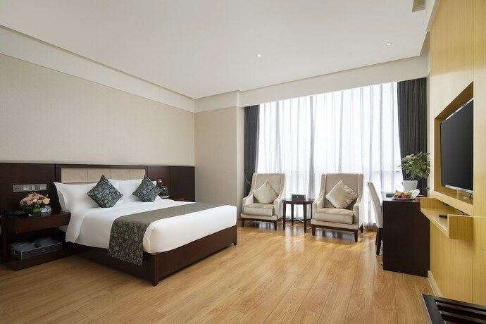 Imagen de la habitación del Hotel Qinxin Yayue. Foto 7