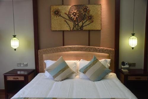 Imagen de la habitación del Hotel Qionghai Xiangshang Aihua. Foto 4