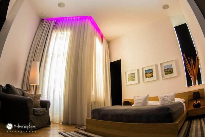 Imagen general del Hotel Qiu Hotel Rooms. Foto 4