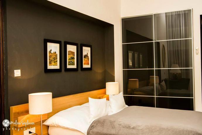 Imagen general del Hotel Qiu Hotel Rooms. Foto 5