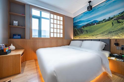Imagen de la habitación del Hotel Qiuguo Beijing Convention Center Bird\'s Nest Beiyuan. Foto 16