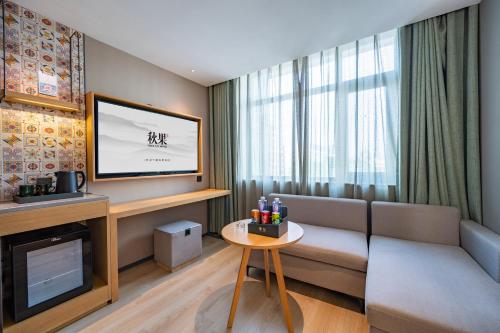 Imagen de la habitación del Hotel Qiuguo Beijing Convention Center Bird\'s Nest Beiyuan. Foto 19