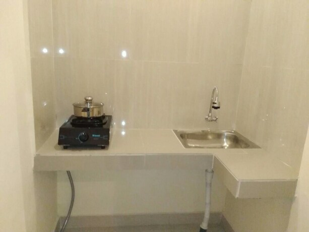 Imagen de la habitación del Hotel Qiul Guest House. Foto 23