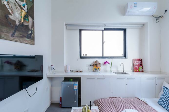 Imagen general del Hotel Qiyu Homestay - West Nanjing Road Branch. Foto 1