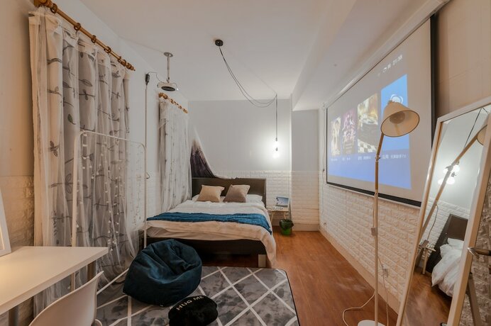 Imagen de la habitación del Hotel Qiyu Homestay - West Nanjing Road Branch. Foto 11