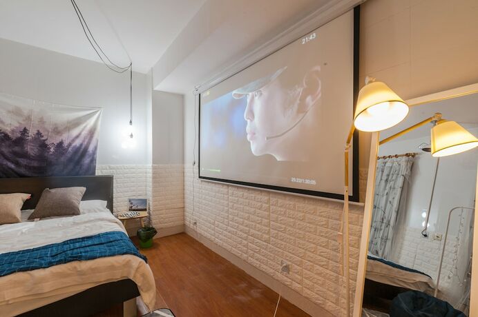 Imagen de la habitación del Hotel Qiyu Homestay - West Nanjing Road Branch. Foto 12