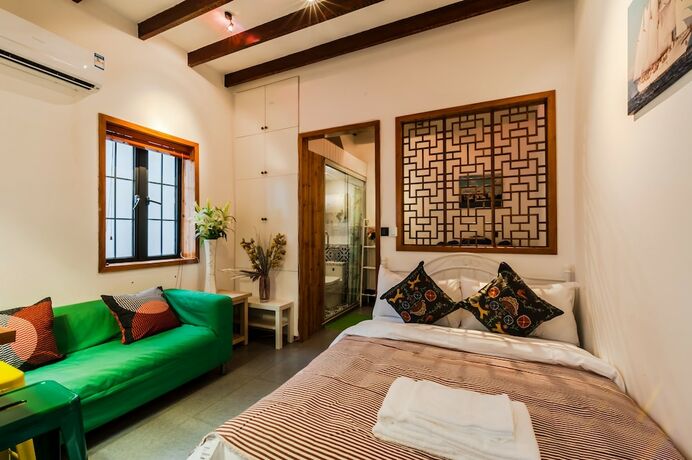 Imagen de la habitación del Hotel Qiyu Homestay - West Nanjing Road Branch. Foto 15