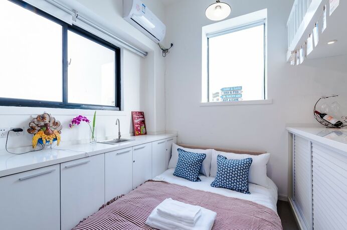 Imagen general del Hotel Qiyu Homestay - West Nanjing Road Branch. Foto 8