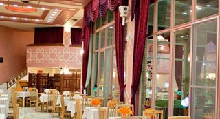 Imagen del bar/restaurante del Hotel Qom International Hotel. Foto 3