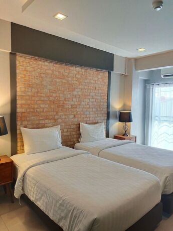 Imagen de la habitación del Hotel Qoo. Foto 30