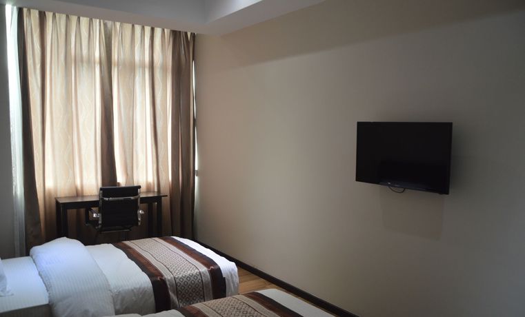 Imagen de la habitación del Hotel Qu Lin Resident. Foto 6