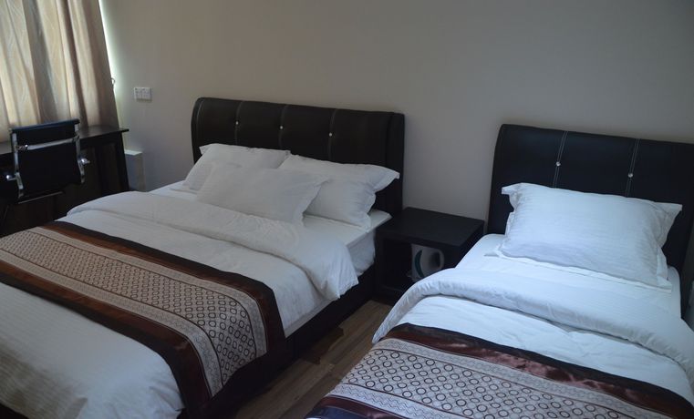 Imagen de la habitación del Hotel Qu Lin Resident. Foto 8