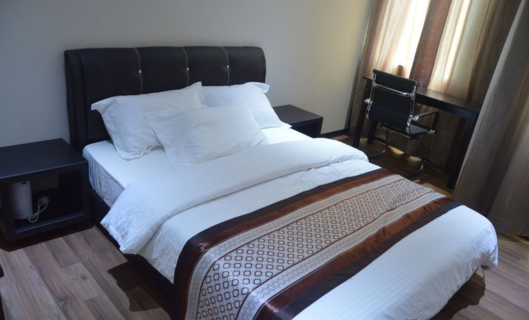 Imagen de la habitación del Hotel Qu Lin Resident. Foto 15