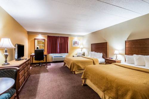 Imagen de la habitación del Hotel Quaint Inn and Suites. Foto 1